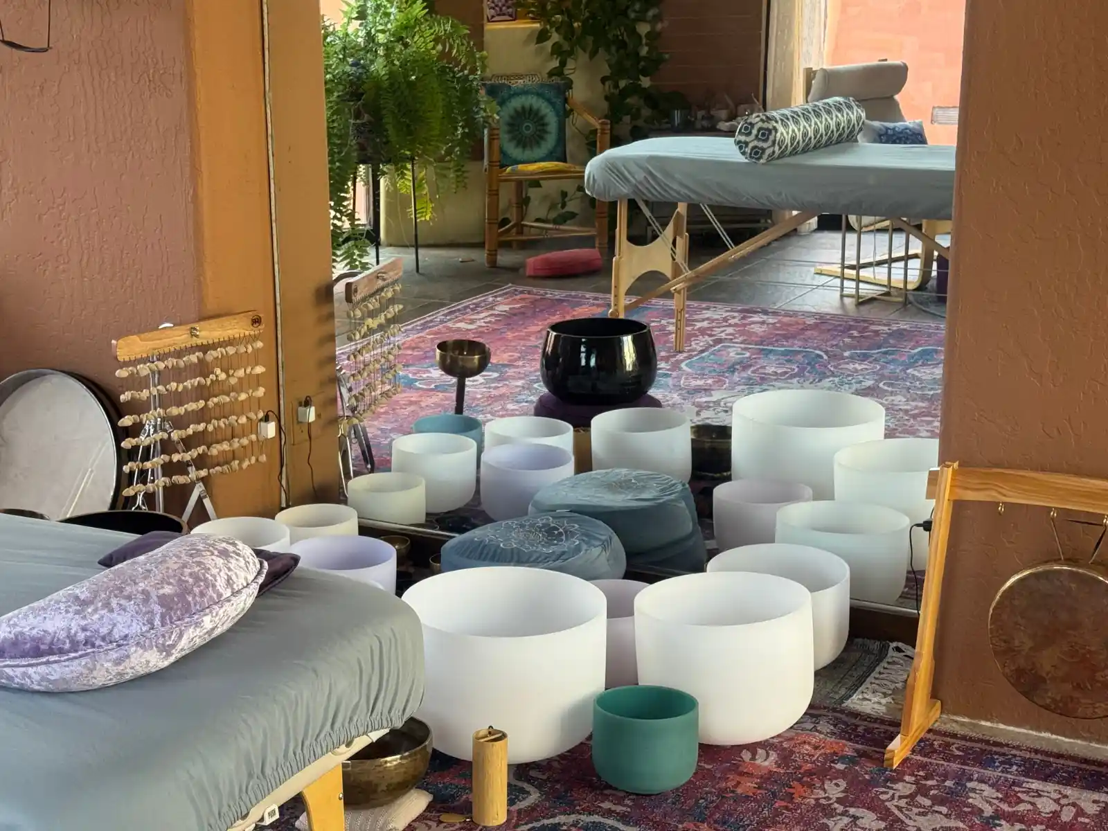sound bath session sound bowls and healing table ready for session